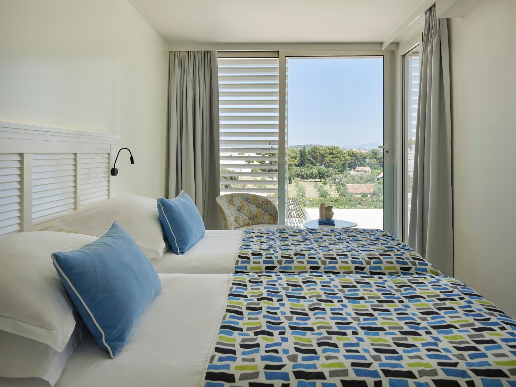 Double or Twin Room with Balcony and Courtyard View